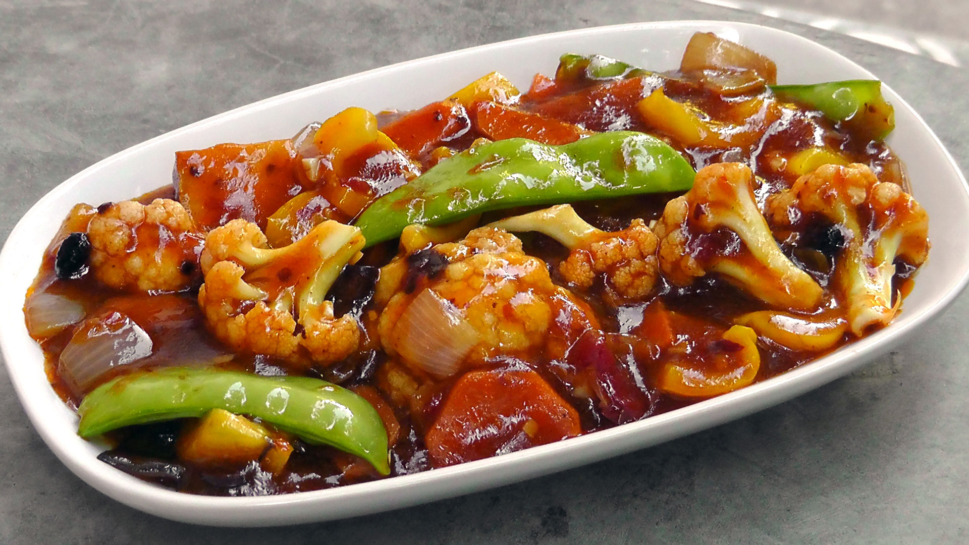 Chinesisches Gemüse in einer Szechuan Soße – International Vegan